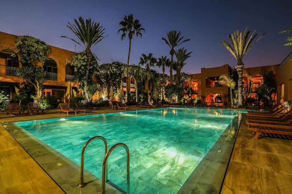 Tikida Golf Palace Agadir Ngoại thất bức ảnh The swimming pool at the hotel